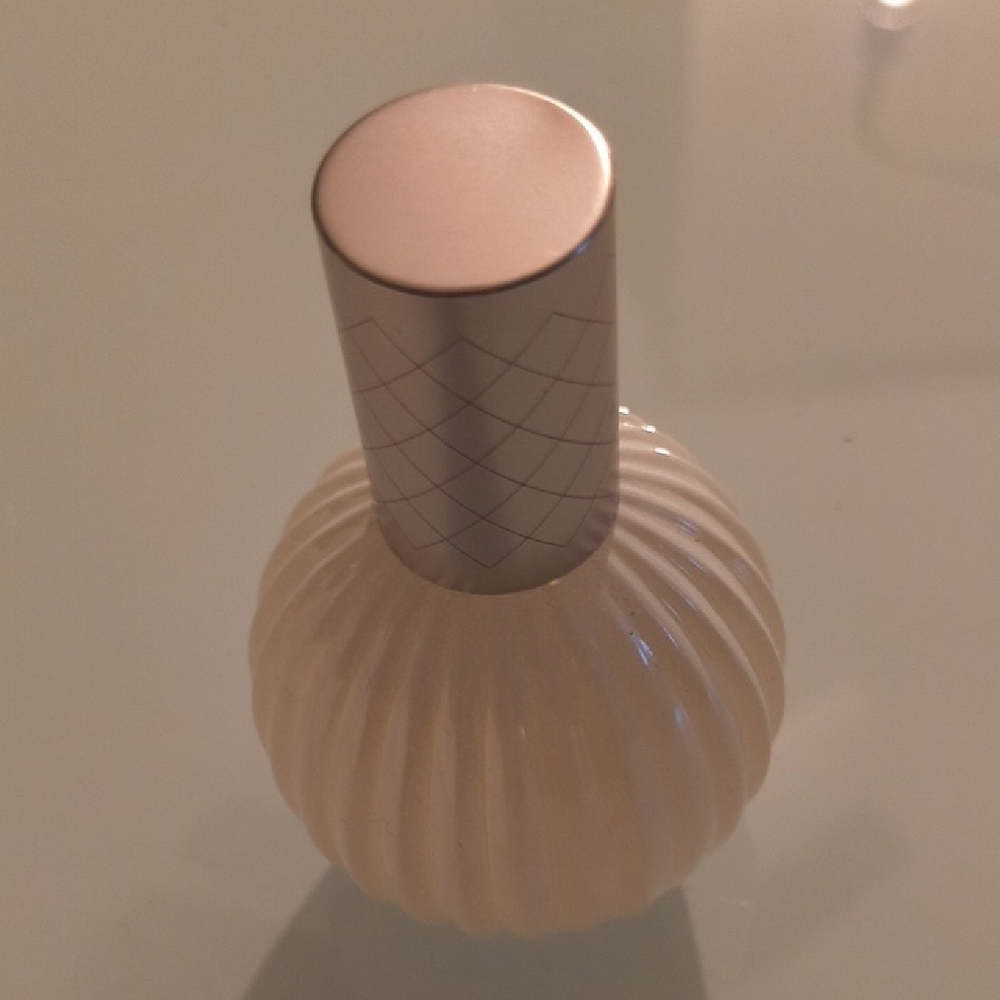 Elegant Cream Perfume Bottle